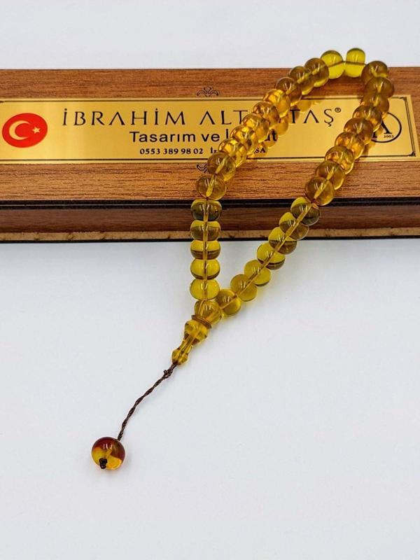 BİLEK BOY ŞEFFAF SARI SİSTEMLİ ATEŞ KEHRİBAR TESPİH - Image 1