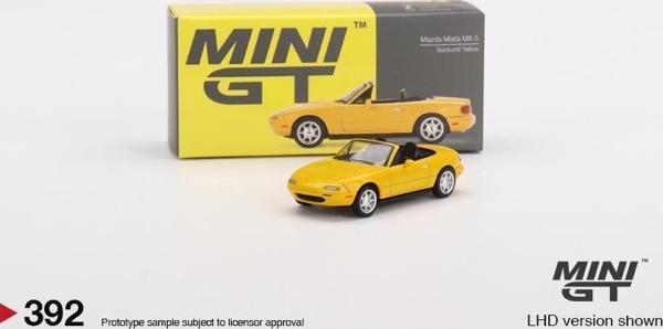 Mini GT Mazda Miata MX-5 (NA) Sunburst Yellow 392 - Image 1