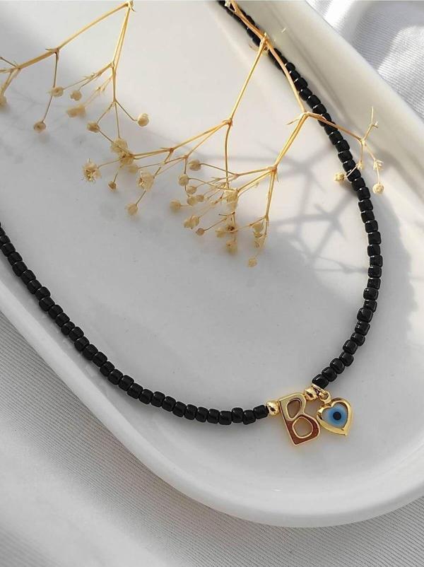 Amabel Jewelerys Harf Ve Kalpli Nazar Detaylı Kum Boncuk Kolye (KADINLAR GÜNÜNE ÖZEL HEDİYELİ) - Image 1