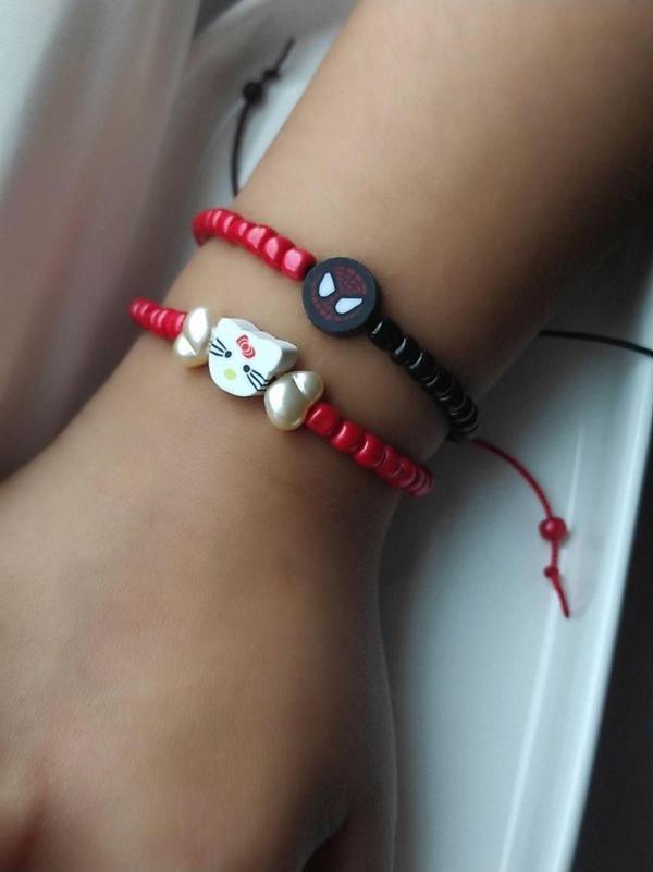 Amabel Jewelerys Hello Kitty ve Spiderman Figürlü Kum Boncuk 2'li Çocuk Bileklik - Image 1