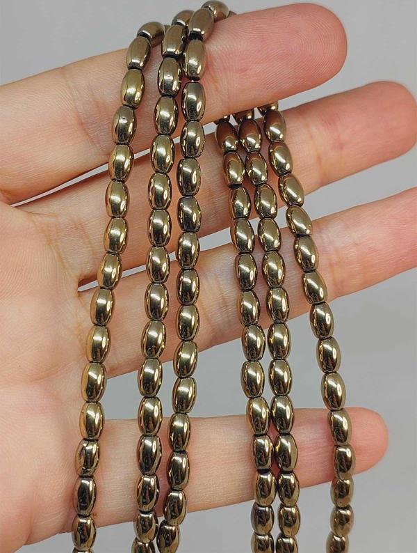 Bileklik Boy Hematit Taşı Arpa Kesim Yarım Dizi 4*5.5mm (49634) (18CM UZUNLUĞUNDADIR) - Image 1