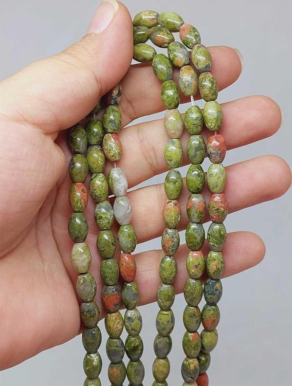 Bileklik Boy Unakit Taşı Arpa Kesim Yarım Dizi 6*8.5mm (51116) (18CM UZUNLUĞUNDADIR) - Image 1