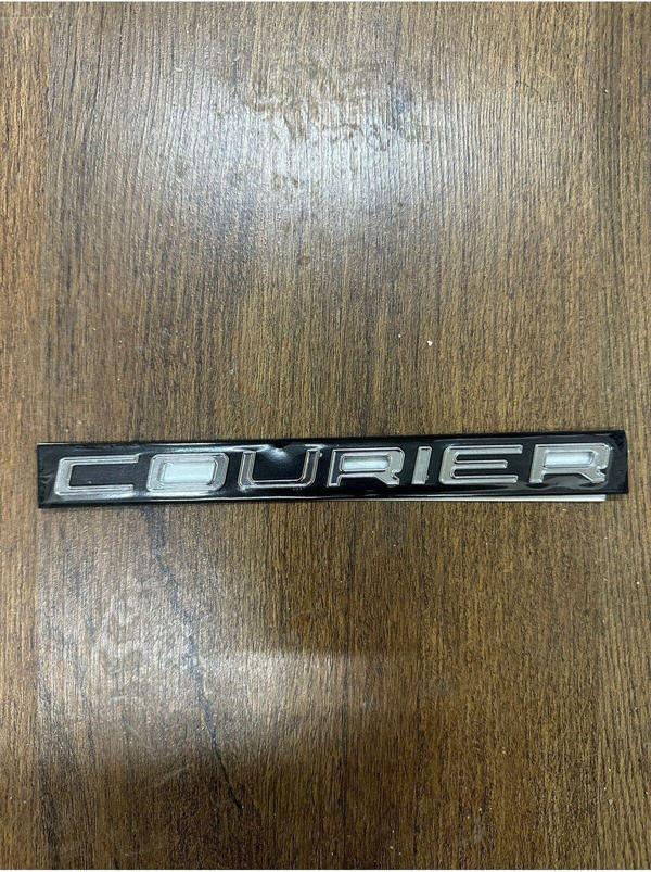 NS Nilser Auto Parts Ford Courier Arka Bagaj Yazısı COURİER - Image 1
