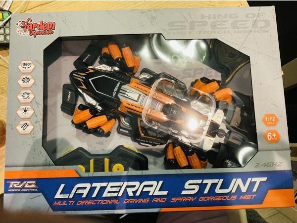 Shem Uzaktan Kumandalı Full Fonksiyon Şarjlı Işıklı Buhar Atan 1:12 Akrobat Araba - Image 1