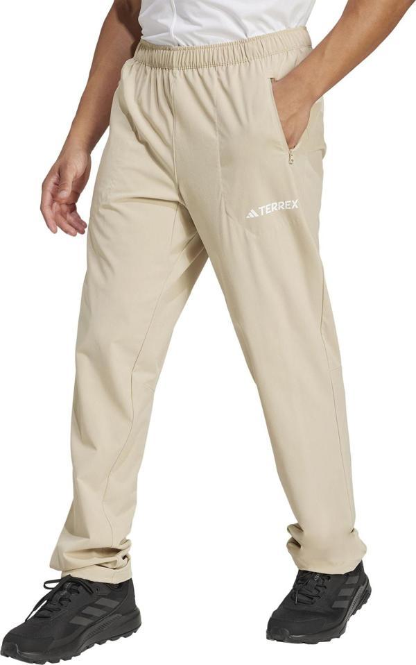 JP0812-E adidas Mt Ess Pants Erkek Eşofman Takımı Bej - Image 1