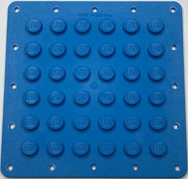 Lego 6395359 Plate, Modified 6 x 6 Flexible Rubber with Stitching Holes Dark Azure - Image 1