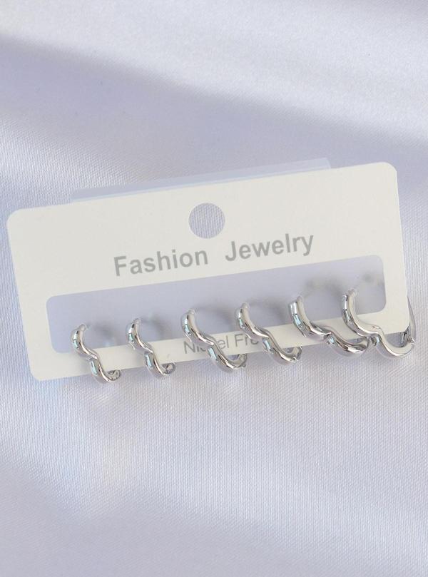 Pirinç Gümüş Renk Kalp Model Küpe Seti - Image 1