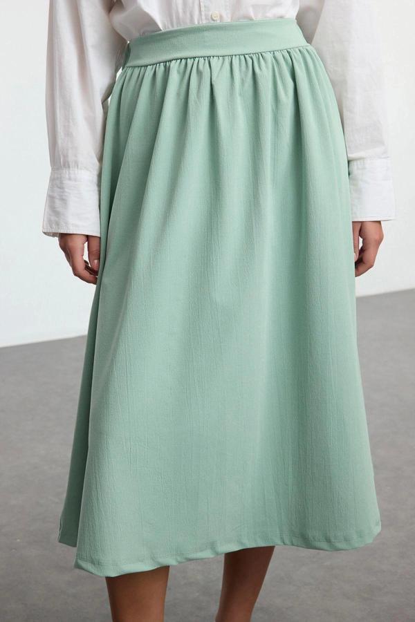 Modern Tarz Astarsız Örme Midi Boy Beli Lastikli Dokuma Görünümlü Örme Kloş Etek - Image 1