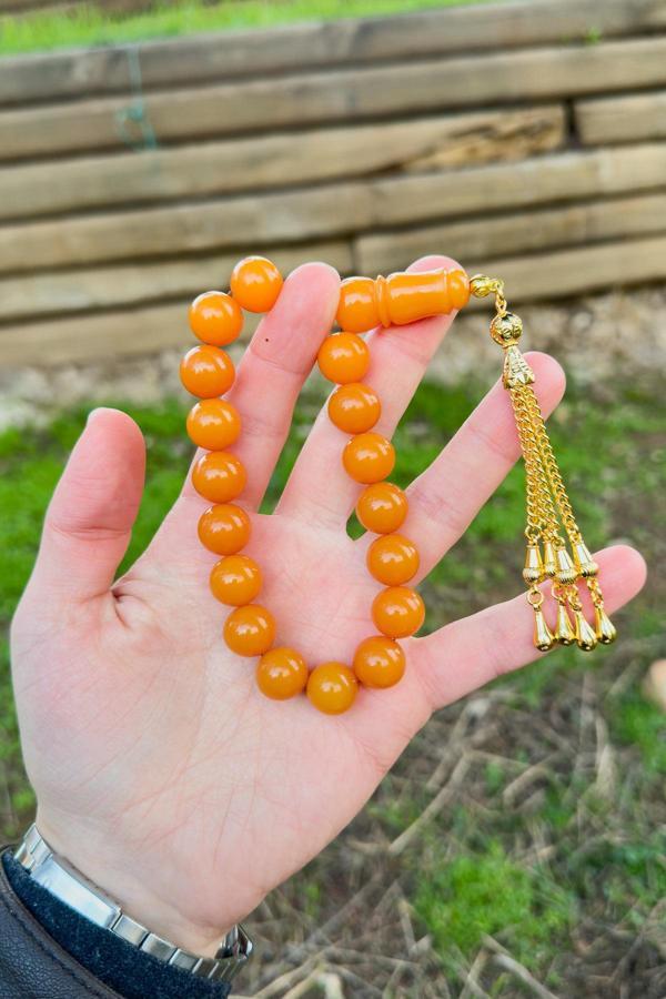 Küre Tane Turuncu Gold Püsküllü 17'lik Sıkma Kehribar Tesbih - Image 1