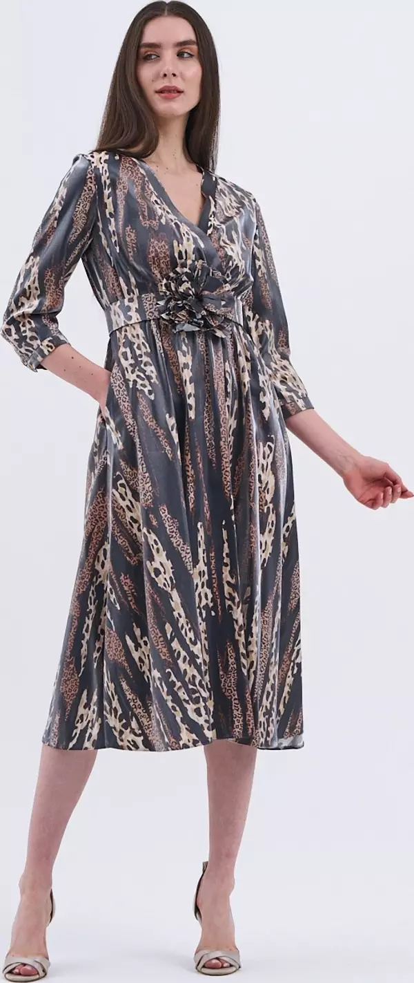 Trend Kadın Şıklığın ve Zarafetin Buluştuğu Midi Boy Elbisemiz - Image 1