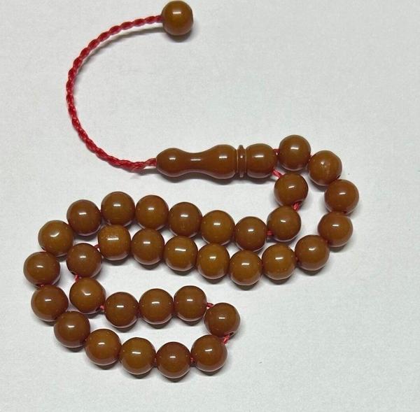 Han Ticarethane Turuncu Küre Kesim Çubuk Sıkma Kehribar Tesbih - Image 1