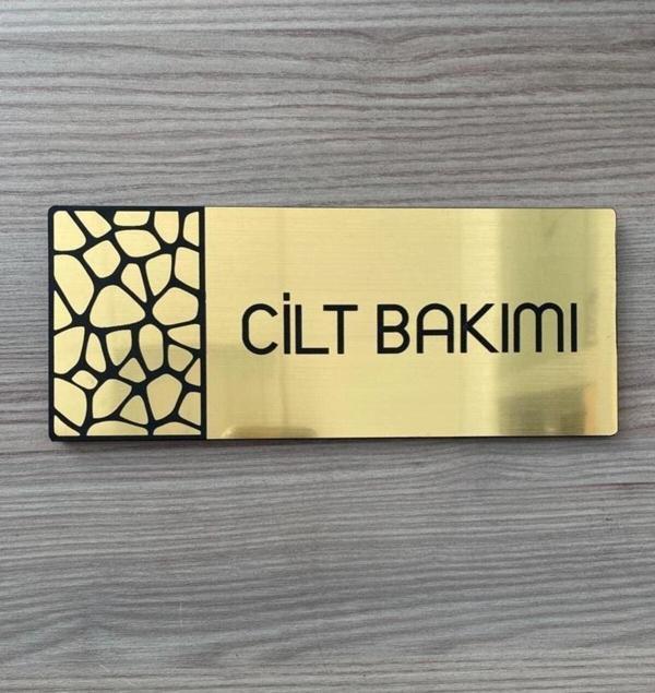 Yönline Metalik Gold Seri Cilt Bakımı Yönlendirme Tabelası - Image 1