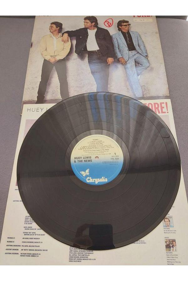 Escoines Koleksiyon 3996367eb1362796de 1986 Huey Lewis The News Vinyl 33lük plak - Image 1