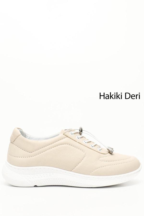 Kadın Bej Bağcıklı Dolgu Taban Hakiki Deri Sneaker - Image 1