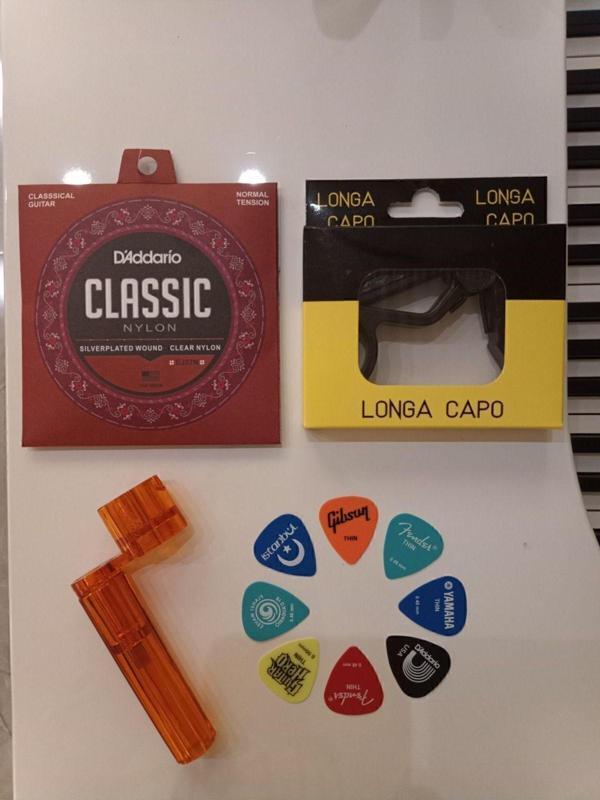 Master Music Daddario Klasik Gitar Teli + Burgu Çevirici + Gitar Kaposu + Pena Seti - Image 1