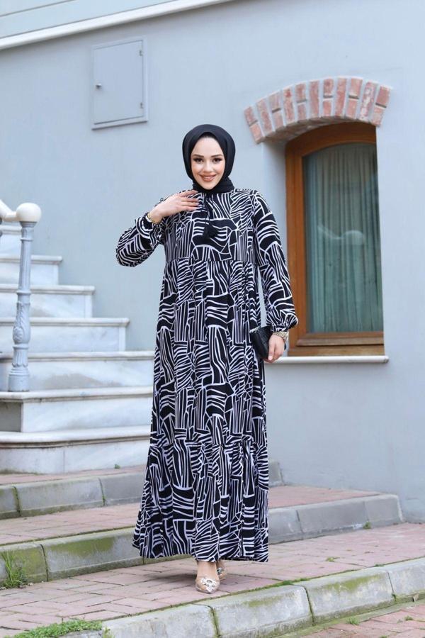 Sfg Life Moda Kadın Tesettür Ön Yaka Püskül Ve Kol Ucu Lastik Detaylı Dokuma Viskon Kumaş Şık Desenli Elbise Siyah 42 - Image 1