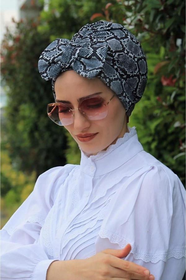Bav Butik Ayvitrin Kadın Yılan Derisi Desenli Çift Taraflı Fiyonklu Bone - Image 1